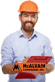 McAlvain employee holding a clipboard